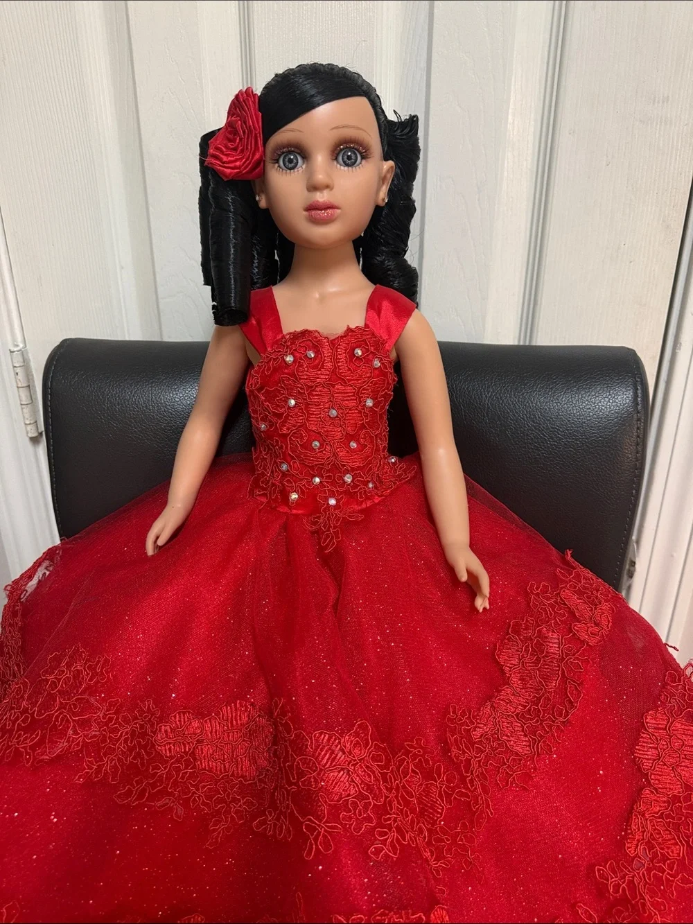 24-inch Quinceañera Keepsake Doll Wearing A Layered, sparkly Red Gown.